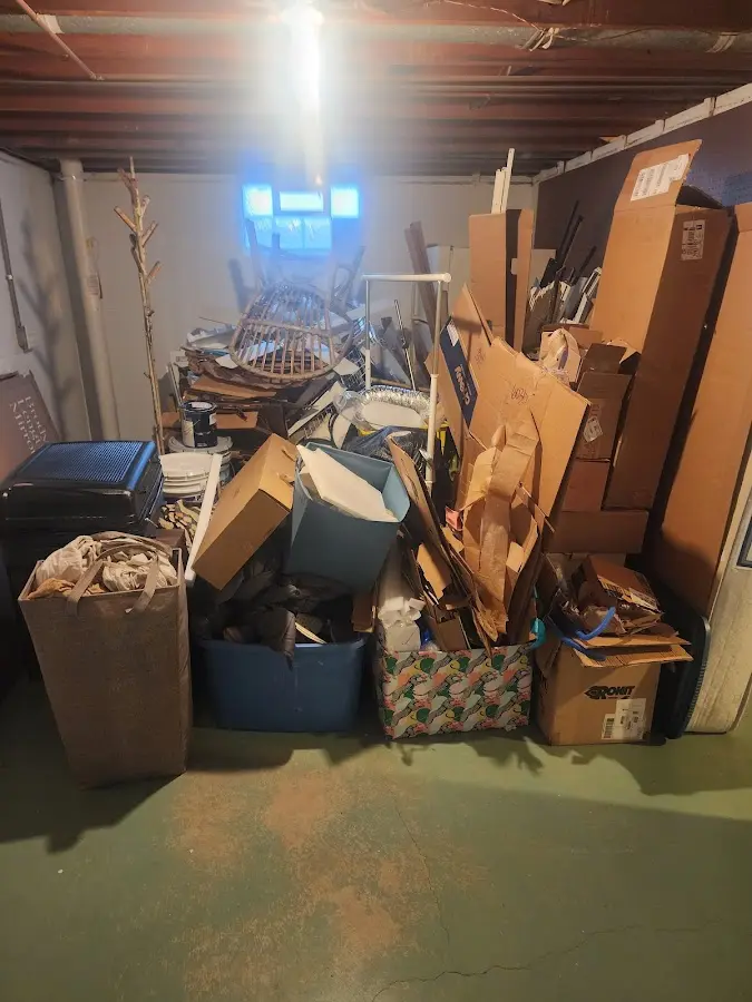 Roll-off dumpster container at job site for 2 Yard Dumpster Rental in Countryside